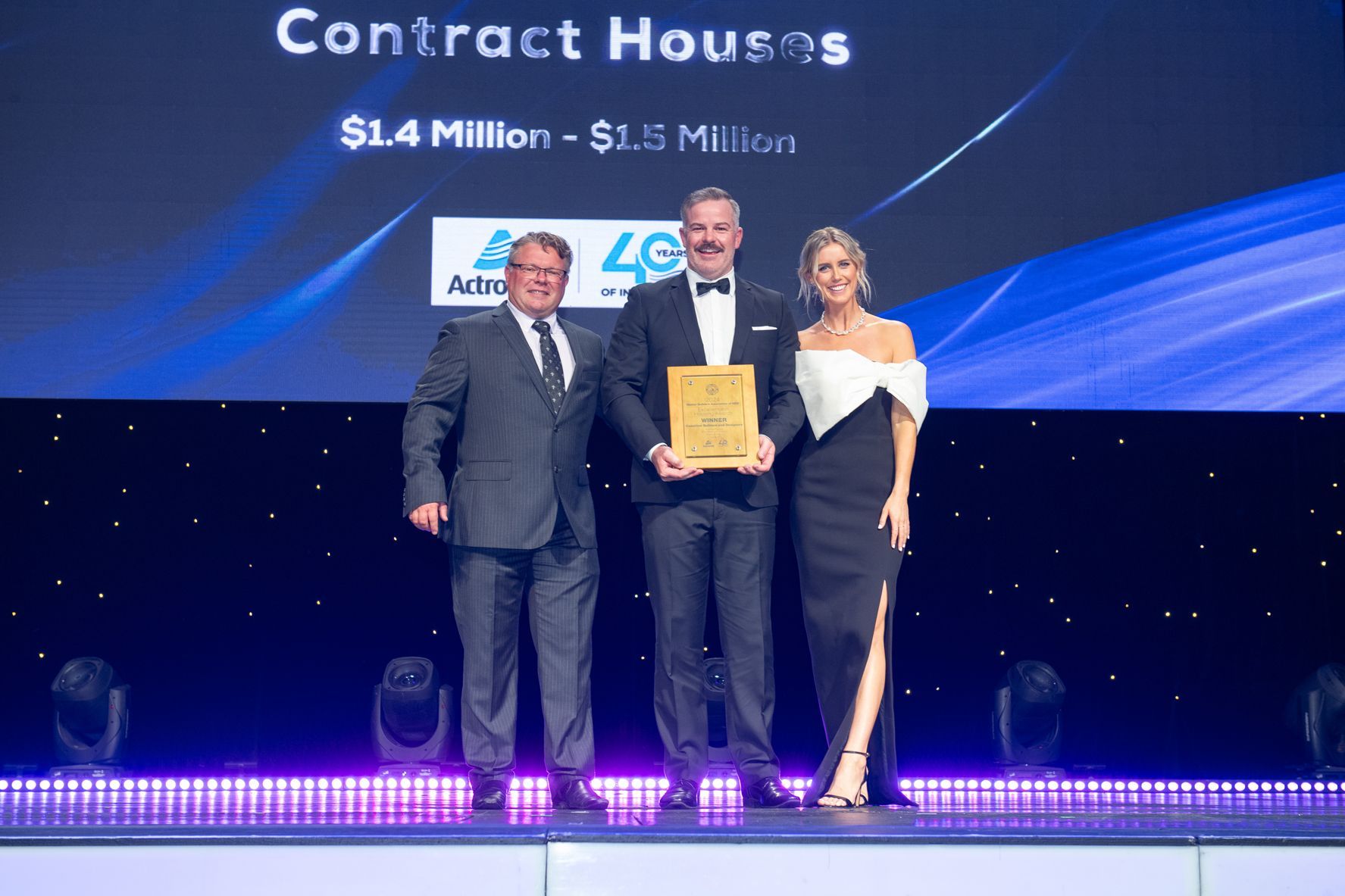 Rowan Parker accepting Winning award. Contract Houses $1.4m-$1.5m for Throsby House Project.