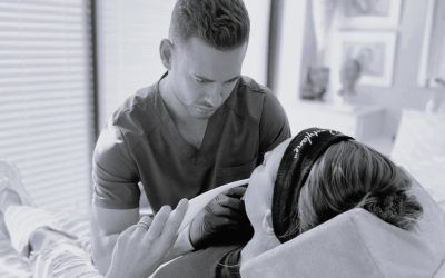 doctor administering care to a patient