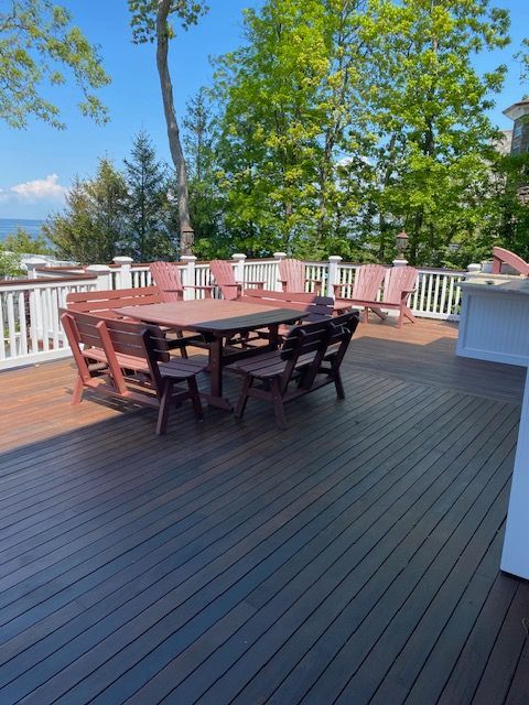 Deck Staining Gathering Area in Backyard