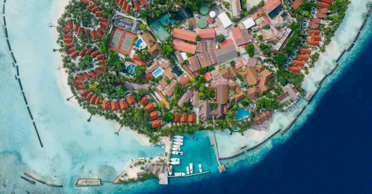Private Maldives island resort with turquoise lagoon for UK travel safety guide