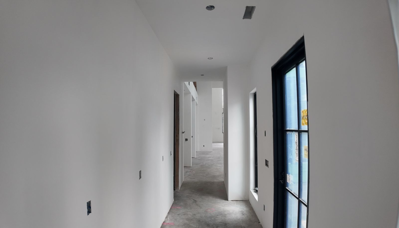 Breezeway hallway with smooth drywall finish, Project Odell