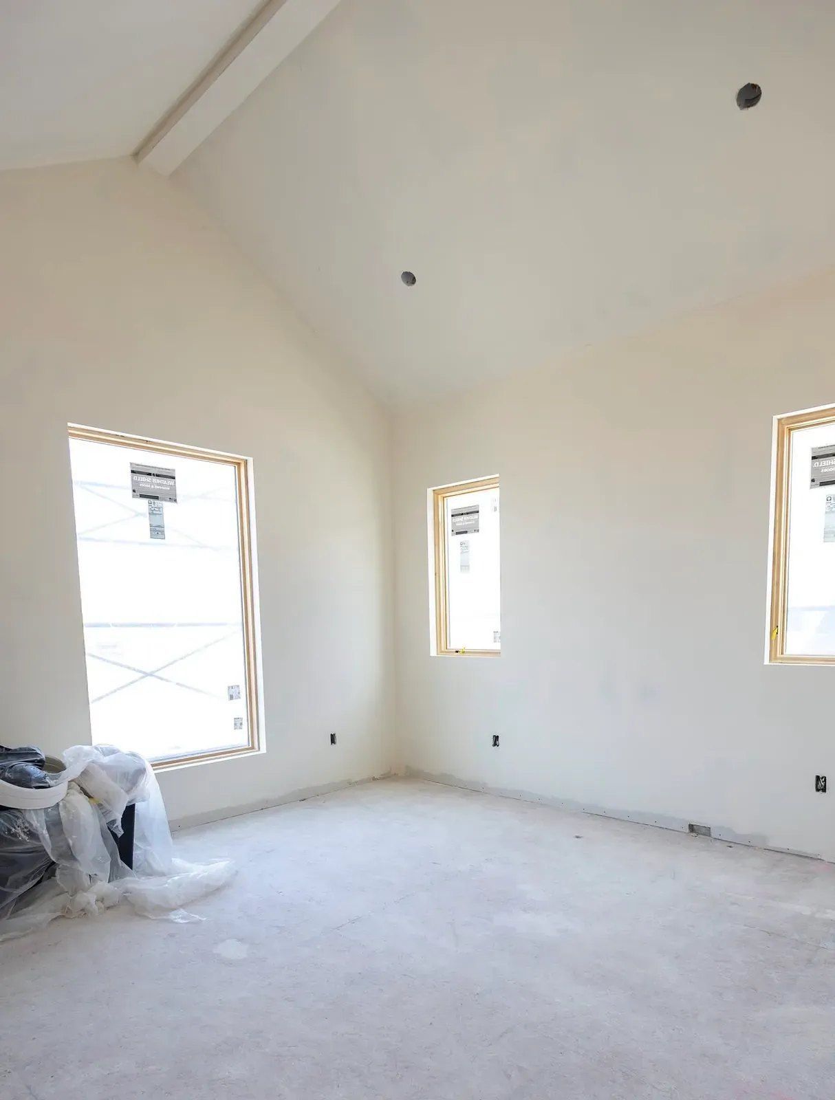 Vaulted bedroom after drywall, Project Odell Bentonville custom home