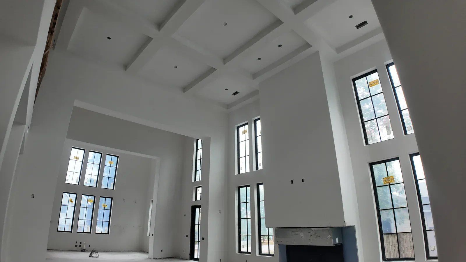 Two-story great room with smooth drywall, Project Odell Bentonville