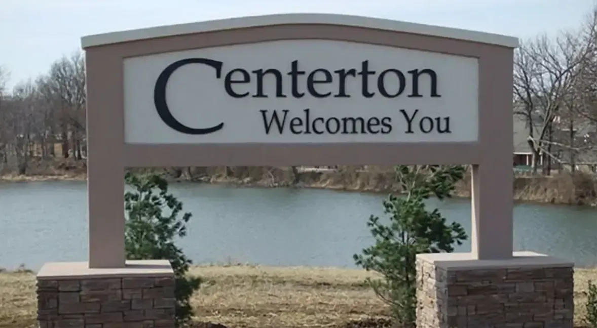 Centerton Welcomes You sign by the lake in Centerton, Arkansas, in our drywall service area