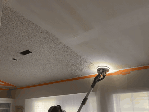 Popcorn ceiling being removed in Northwest Arkansas by Superior Drywall & Finishing