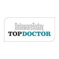 Delaware Today Top Doctor logo with gray and teal text on white background