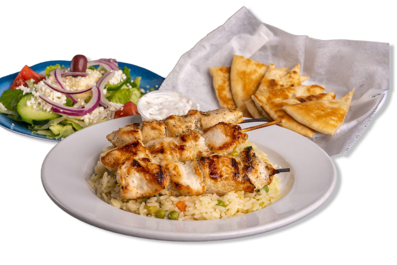 A plate of food with a salad and pita bread on a table.