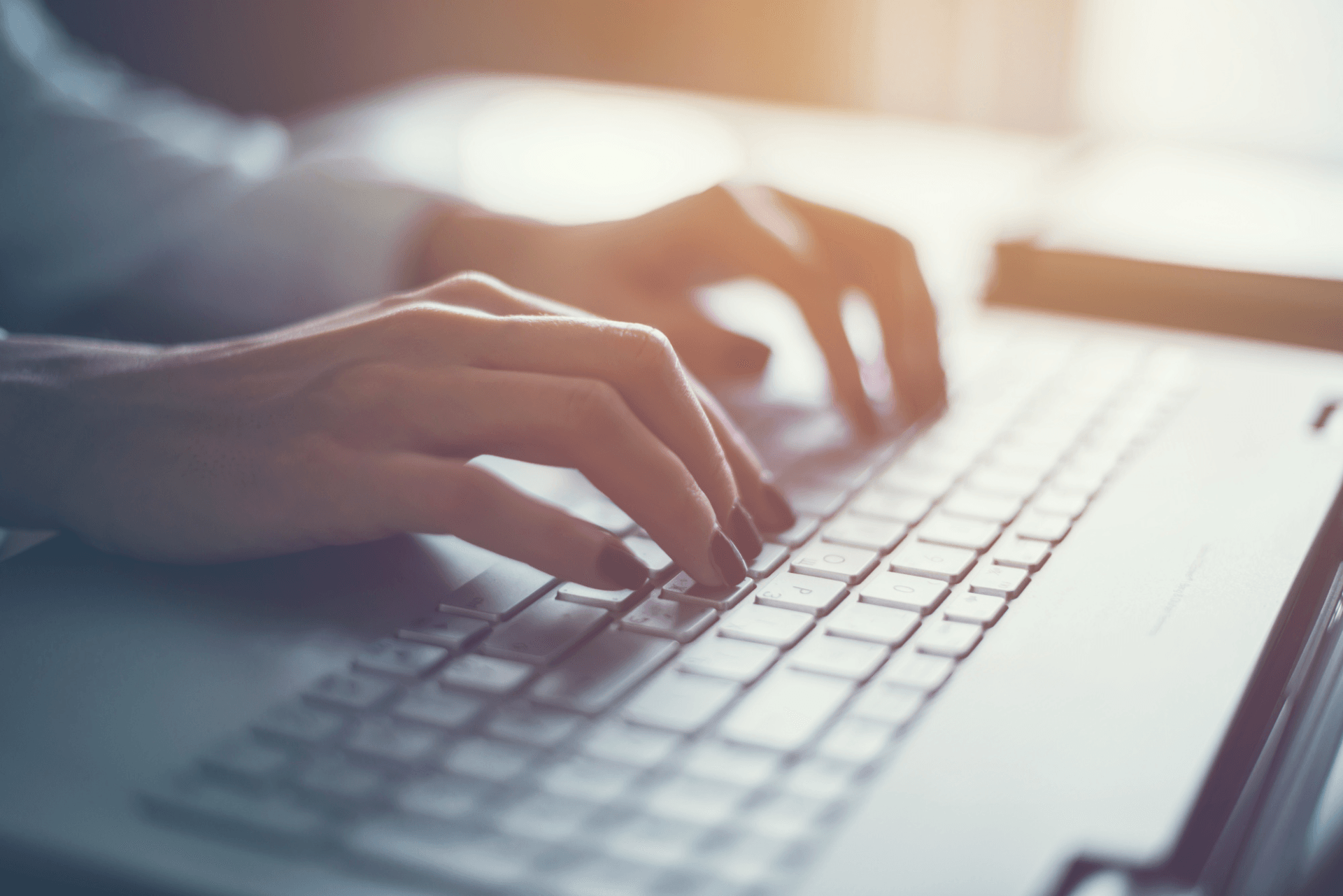 digital media marketing. Person typing on a keyboard