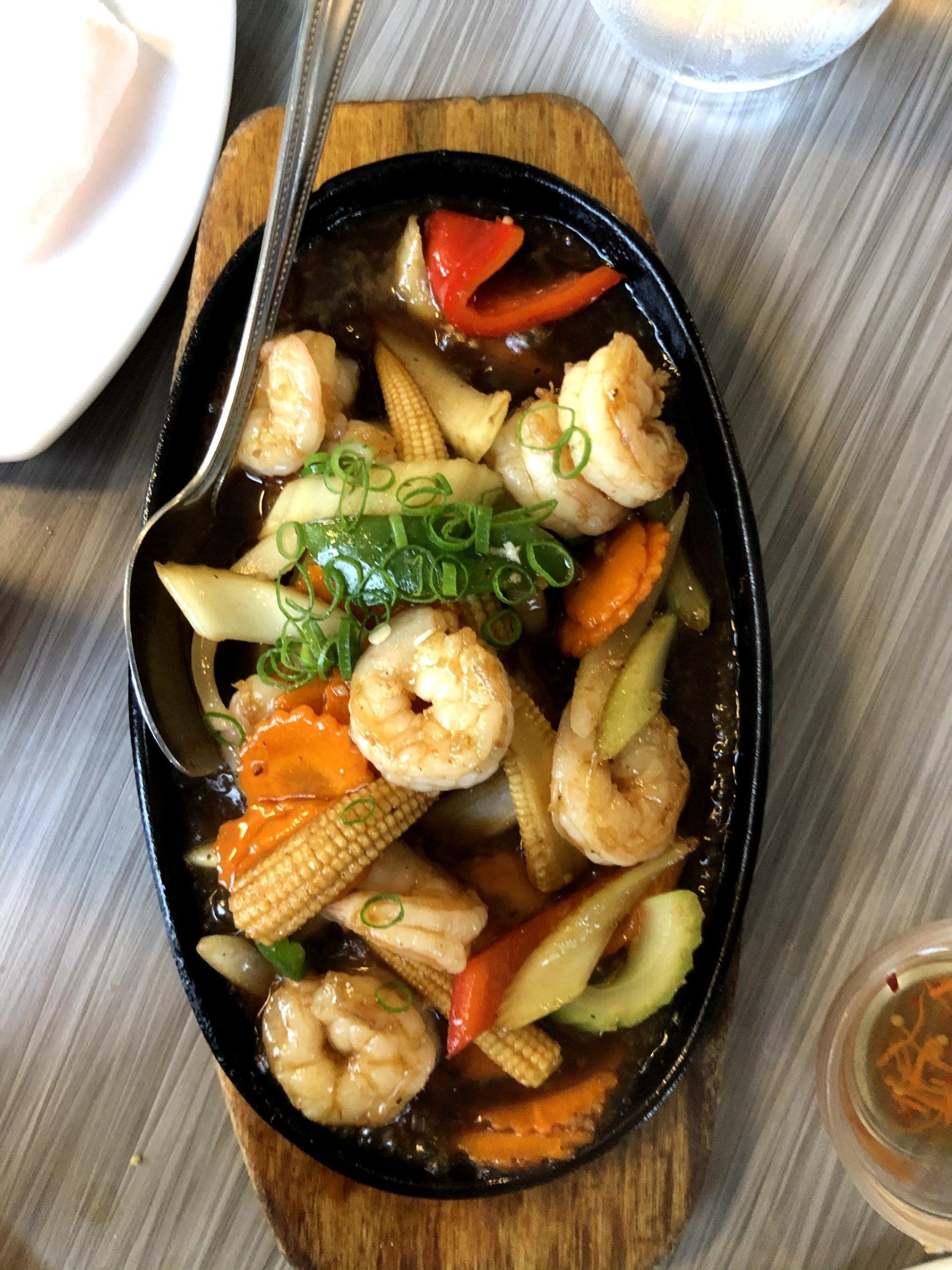 Vietnamese food on a sizzling plate