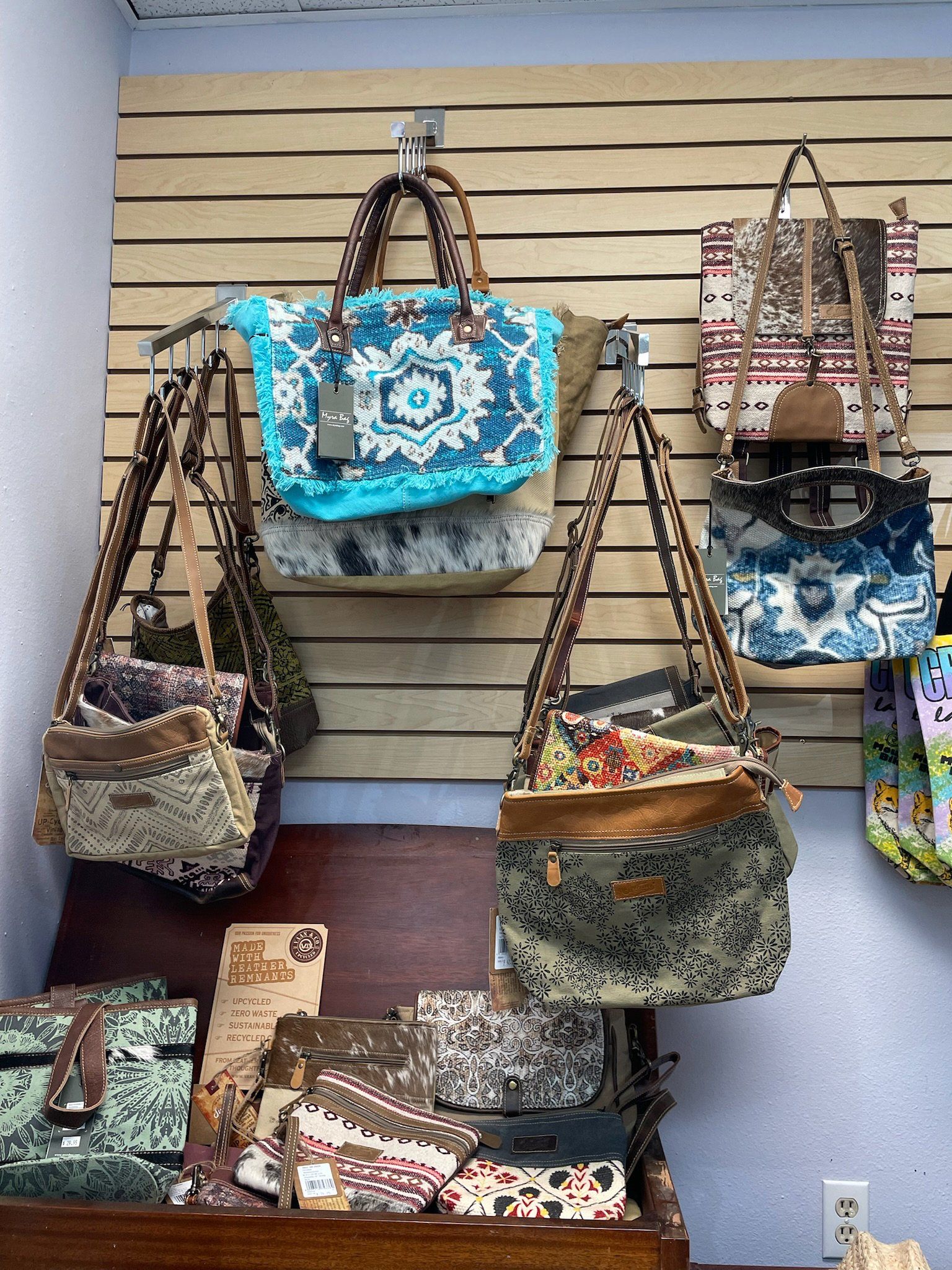 purses and bags on racks