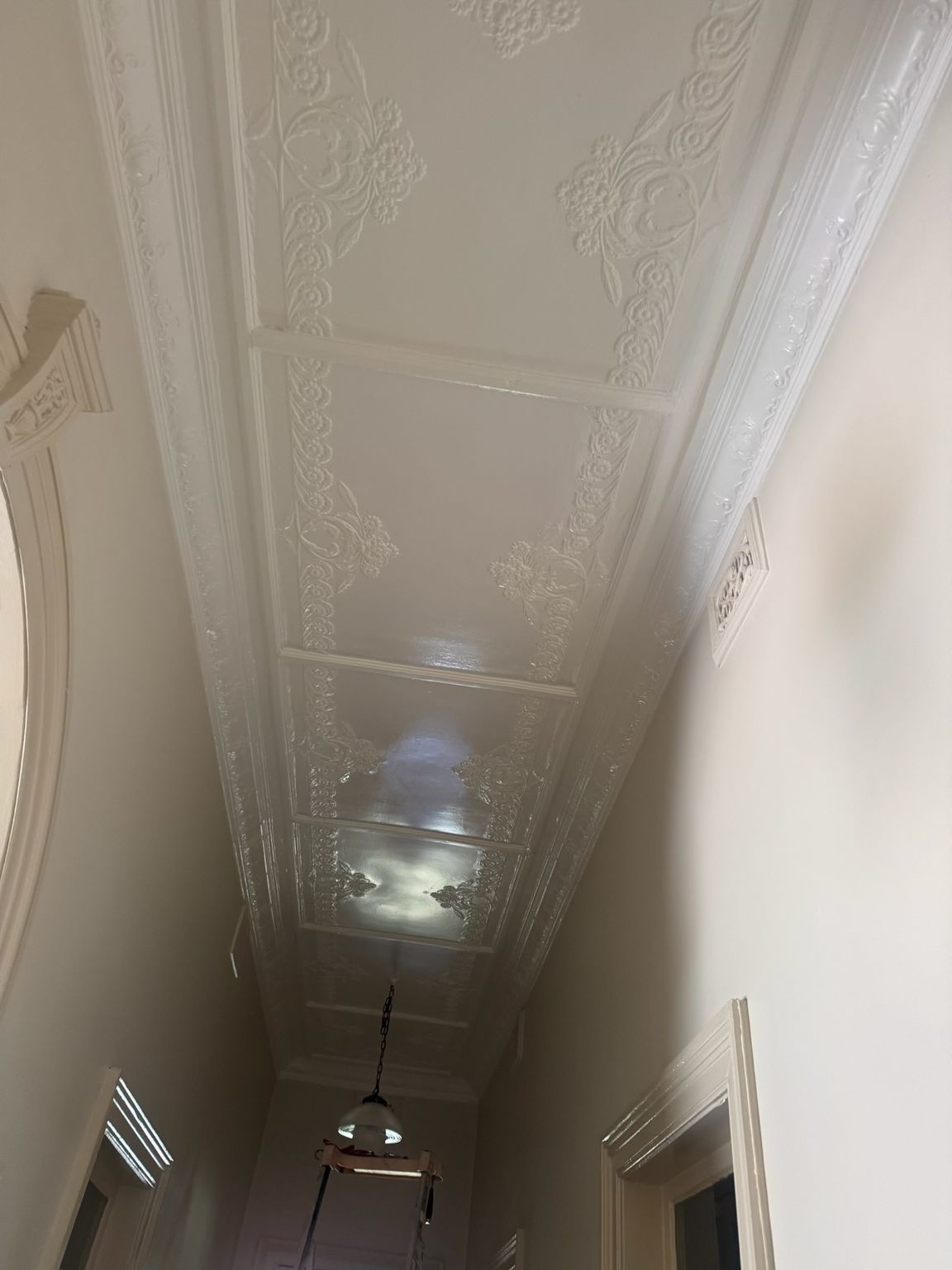 Narrow Hallway With Ornate White Ceiling Molding — Robert Seeliger Painter And Decorator in Gilgandra, NSW