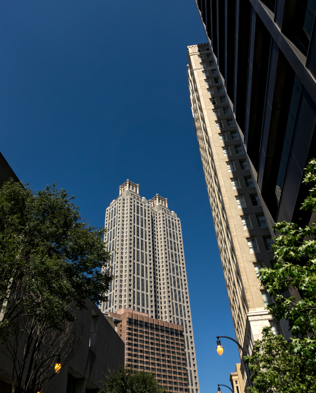 A tall building with a blue sky in the background