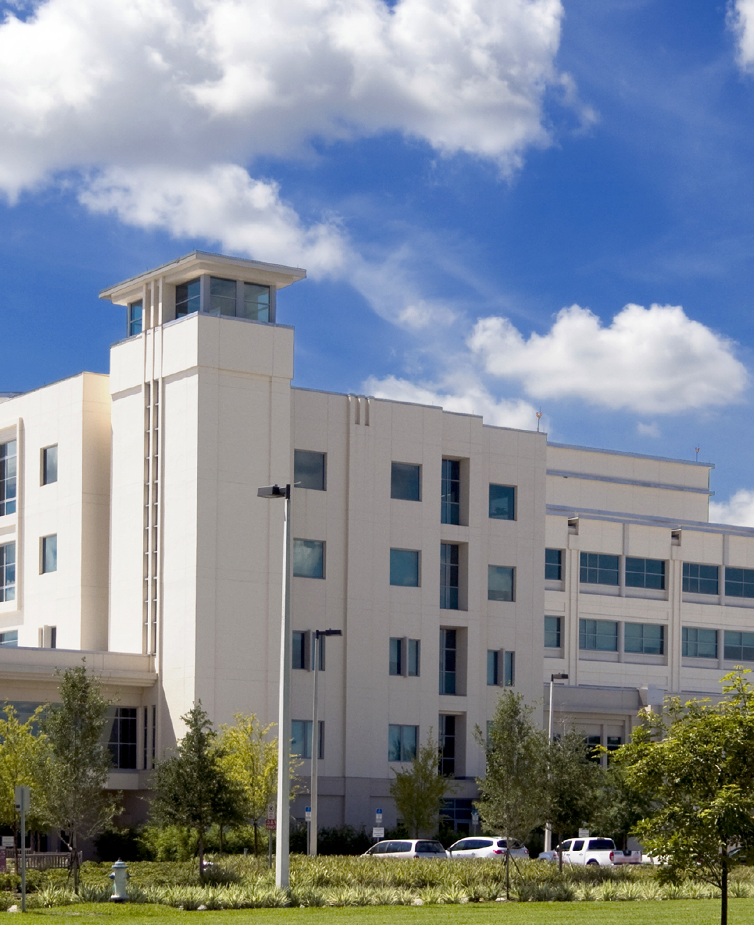 A large white building with a tower on top of it