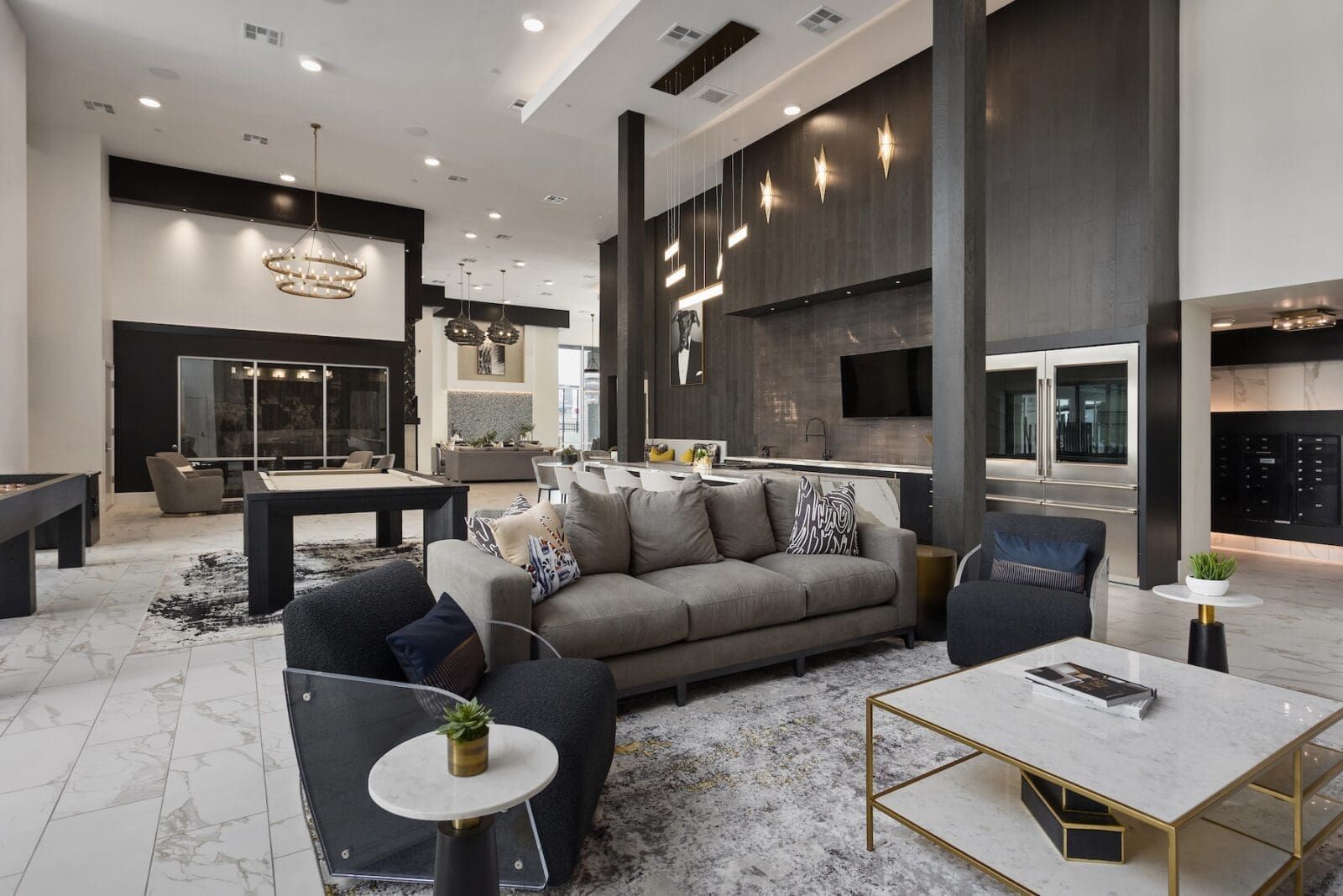 Modern lounge area with pool table and seating at Echo Biltmore in Phoenix AZ.