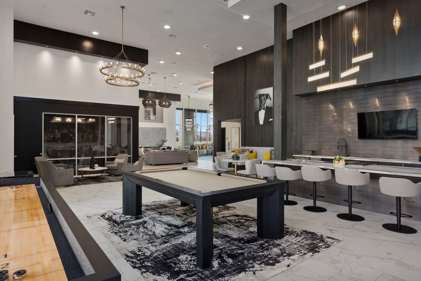 Billiard table and bar area in the apartment clubhouse lounge at Echo Biltmore in Phoenix AZ.