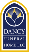 Dancy Funeral Home LLC logo in blue and gold with a stylized flower emblem