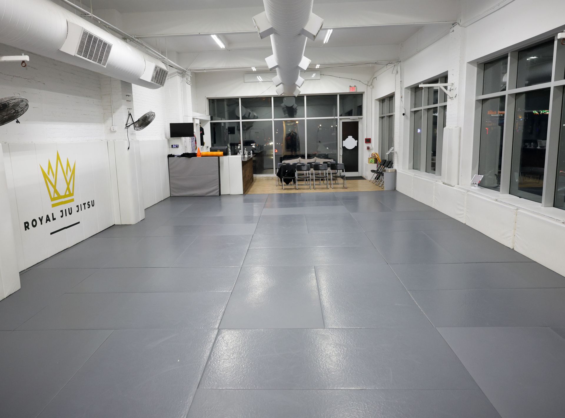 Adults training Brazilian Jiu-Jitsu at Royal Jiu-Jitsu Queens in Queens, NY, improving fitness and confidence.