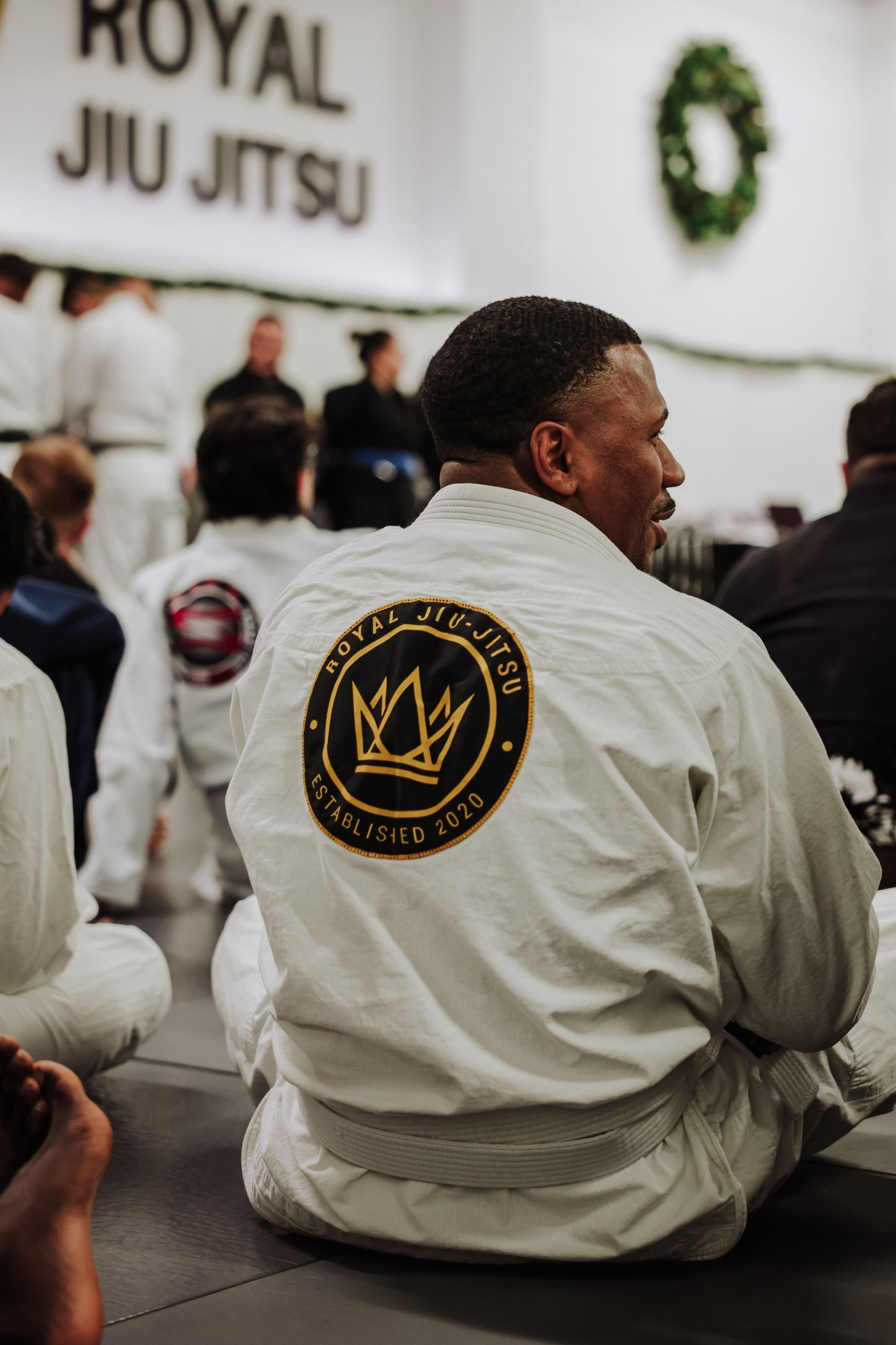 Adults drilling Brazilian Jiu-Jitsu techniques at Royal Jiu-Jitsu Queens in Queens, NY for fitness and confidence.