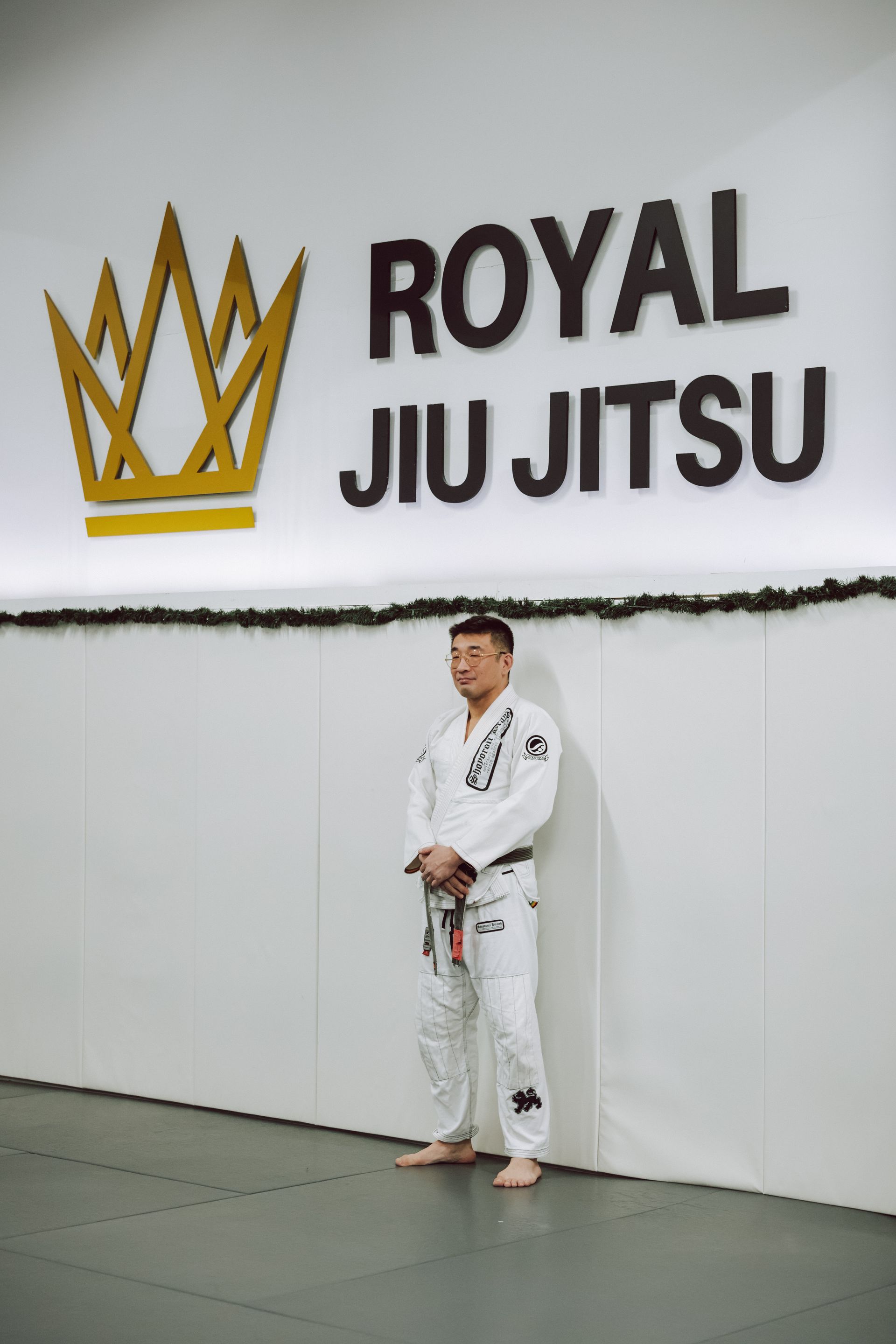 Adults drilling Brazilian Jiu-Jitsu technique at Royal Jiu-Jitsu Queens in Queens, NY to build functional strength.