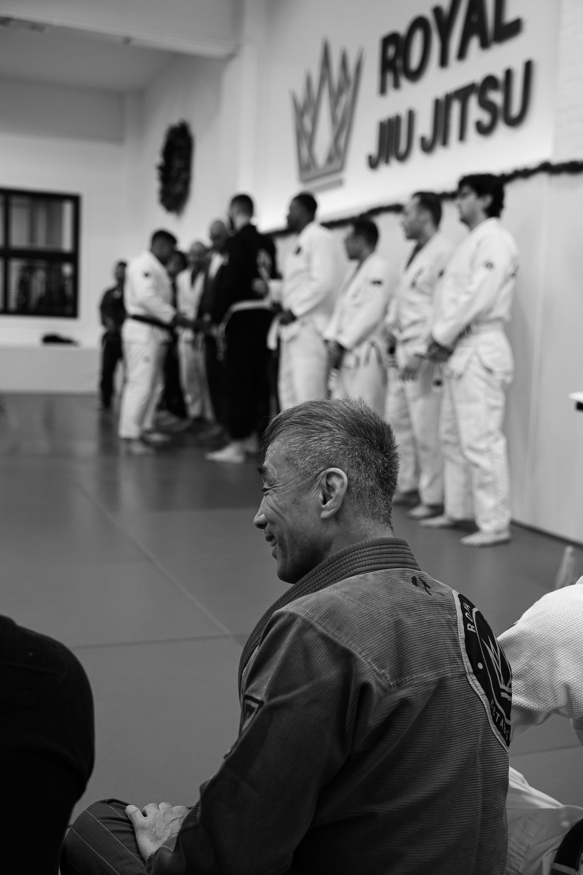 Adults and youth practicing Brazilian Jiu-Jitsu at Royal Jiu-Jitsu Queens in Queens, NY.