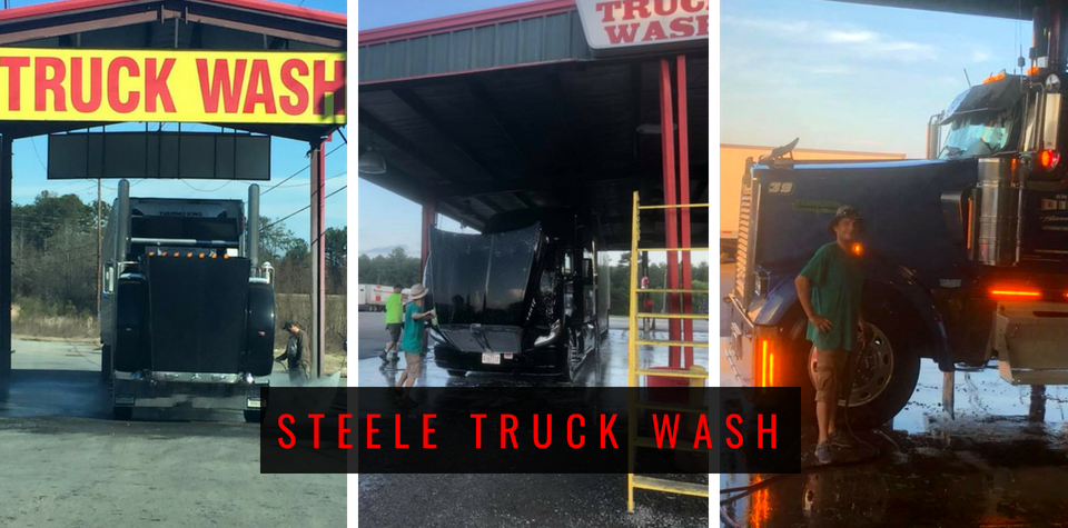 Steele Truck Wash entrance with semi-trucks under the wash bay in daylight