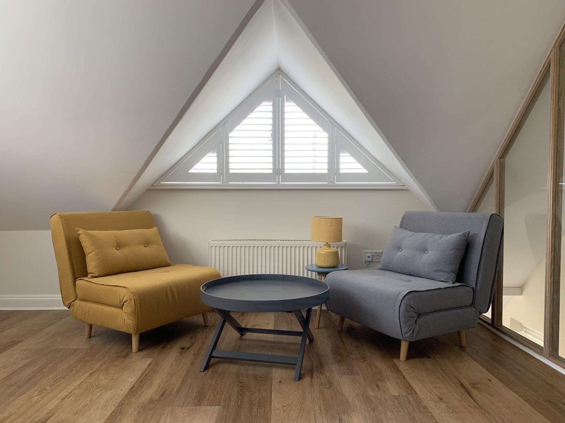Berkshire shaped plantation shutters