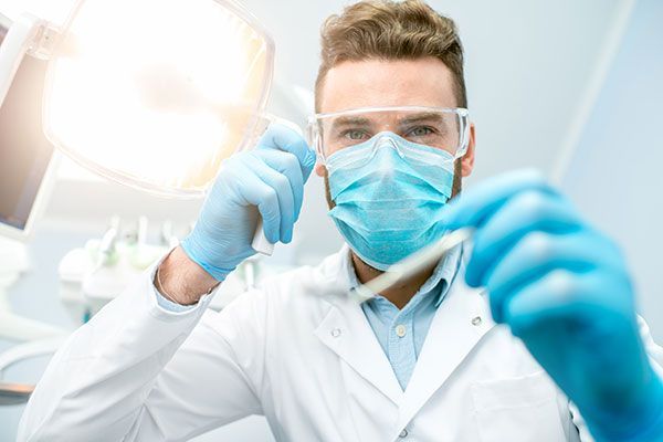 How Dentists Protect Themselves From Infectious Disease Using PPE per CDC guidance