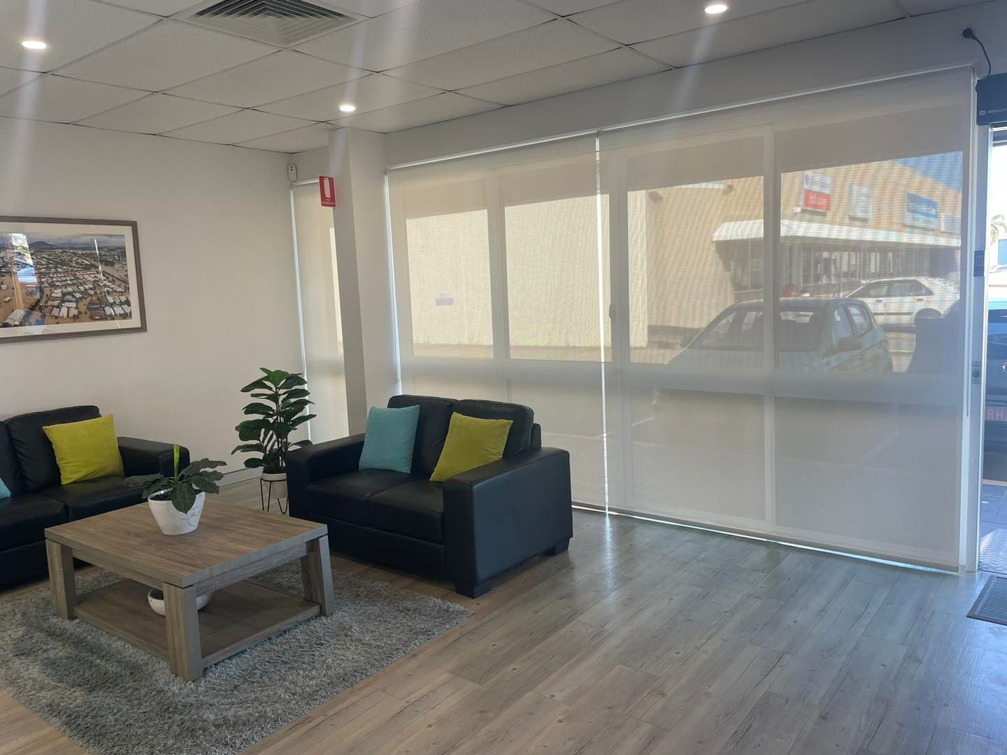 A Room With a Large Window and a Black Blind on It — Cover Me NQ in Currajong, QLD