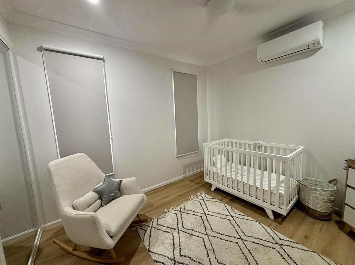 There is a Crib and a Rocking Chair in the Room — Cover Me NQ in Currajong, QLD