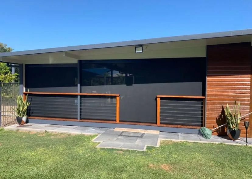 A House With a Screened in Porch and a Large Window — Cover Me NQ in Currajong, QLD