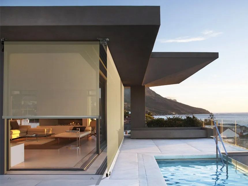 A House With a Swimming Pool in Front of It — Cover Me NQ in Currajong, QLD