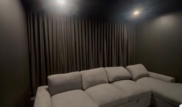 A Living Room With a Couch, Chair, Table and Ceiling Fan — Cover Me NQ in Currajong, QLD