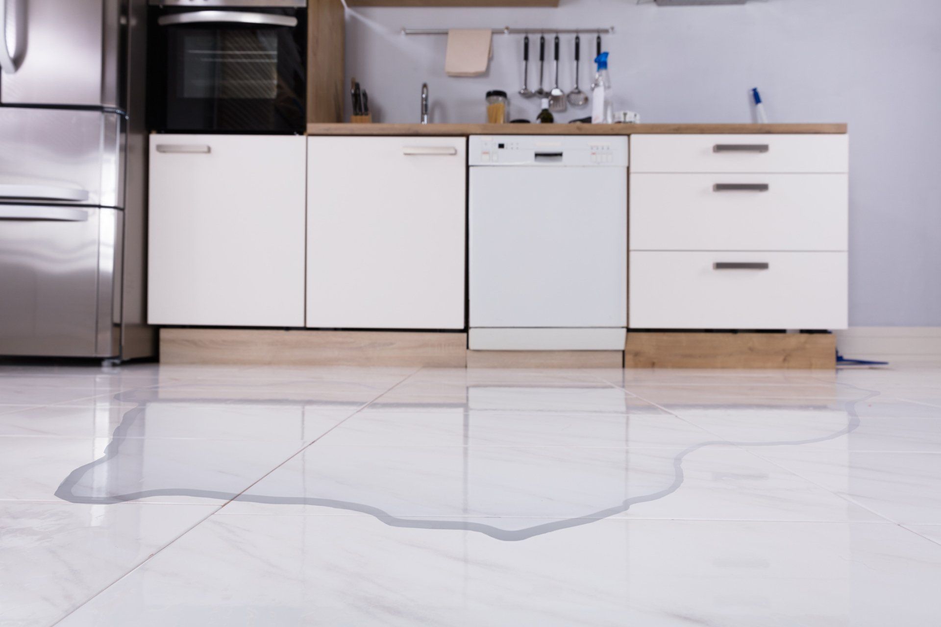 Spilled Water On Kitchen Floor — Concord, NC — Faithful Appliance Repair