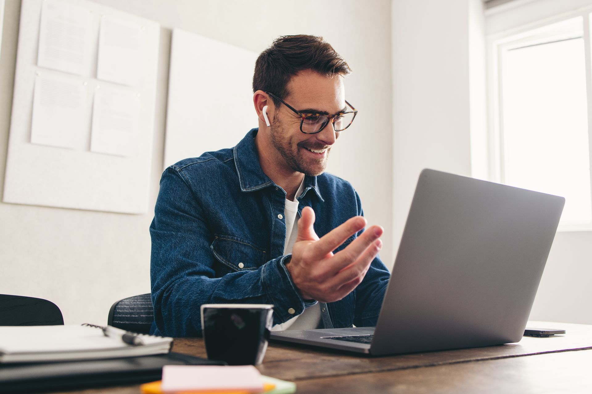 A man works on his estate plan over a video call.