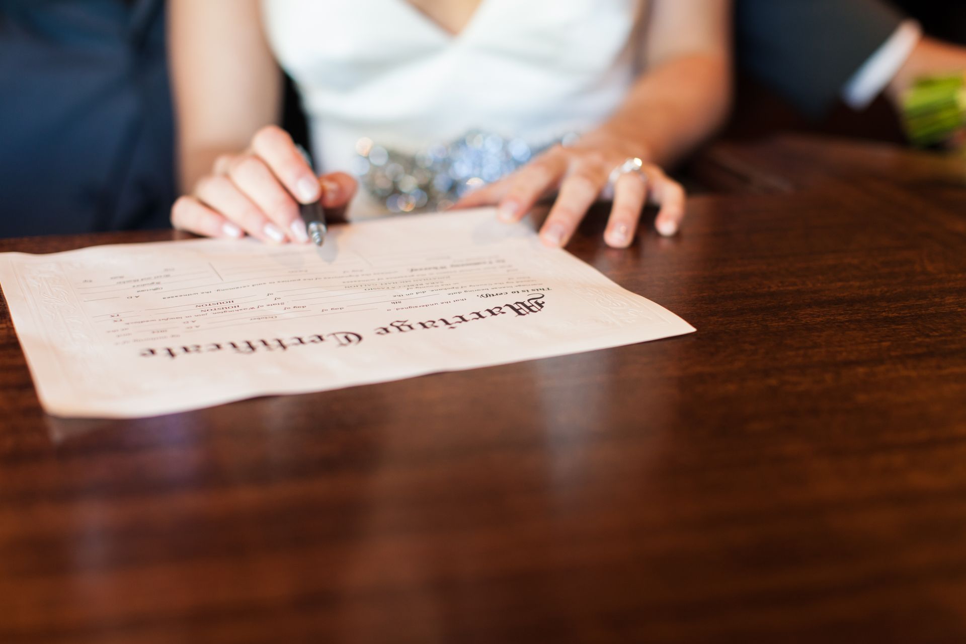 A Minnesota couple signs their marriage certificate.