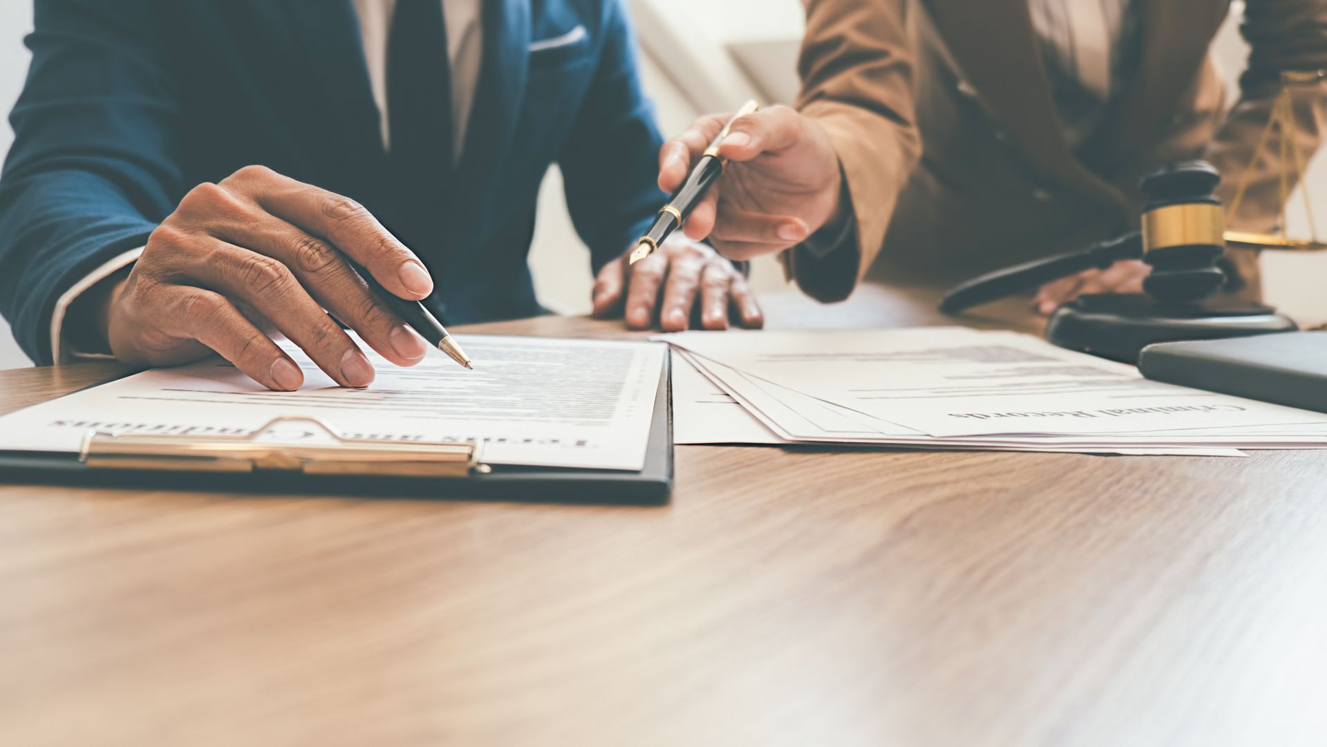 An attorney offers pre-paid legal services to a business owner.