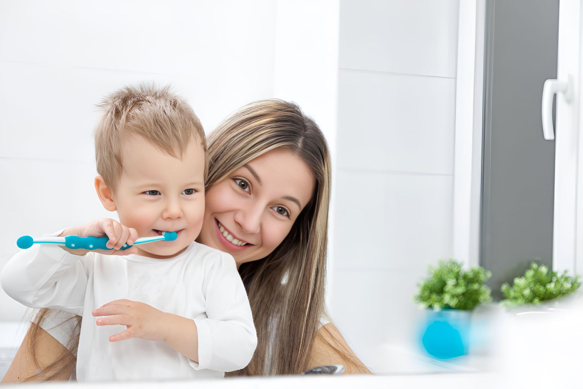 A Woman and a Child Brushing his Teeth — Newcastle Paediatric Occupational Therapy in Floraville, NSW