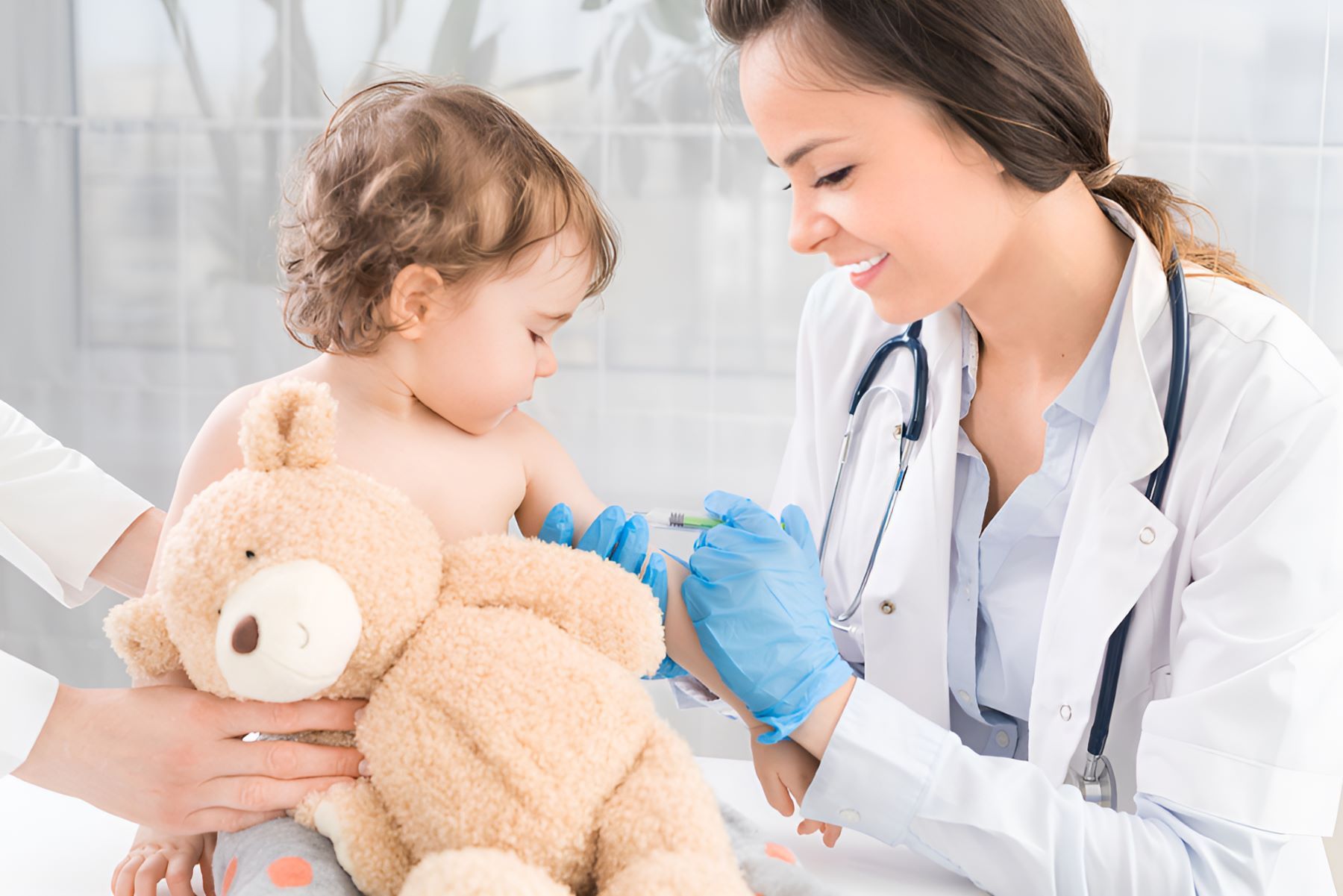 A Doctor is Giving a Child an Injection — Newcastle Paediatric Occupational Therapy in Floraville, NSW