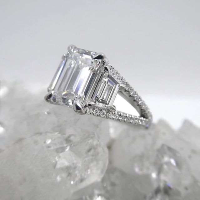 Kimberfire emerald three stone split shank engagement ring