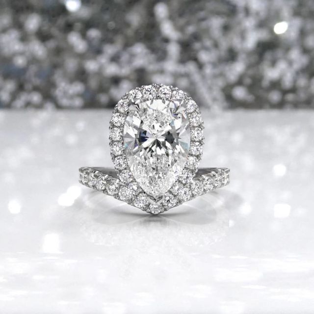 kimberfire pear shape halo engagement ring