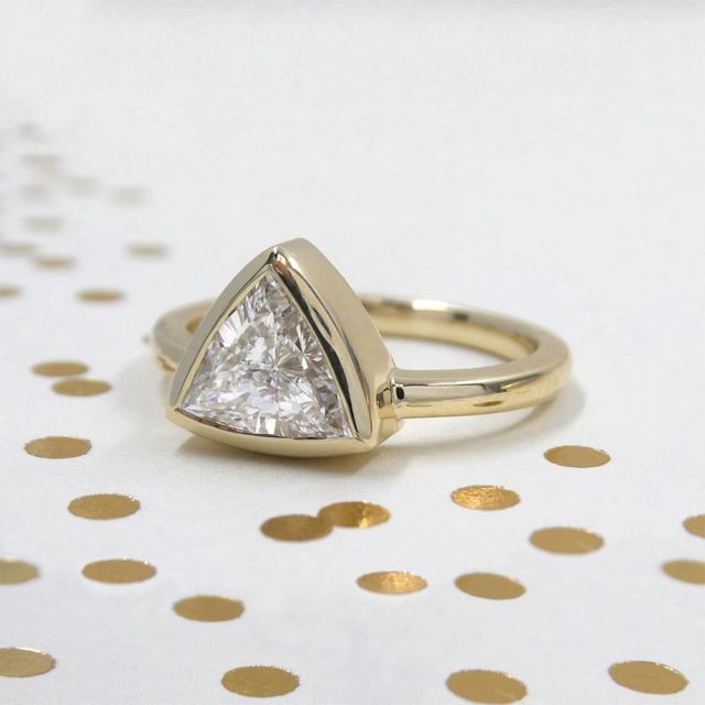 Kimberfire trilliant bezel solitaire engagement ring