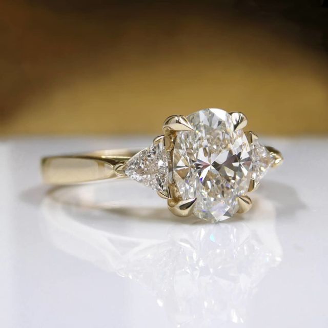 kimberfire oval and trilliant engagement ring