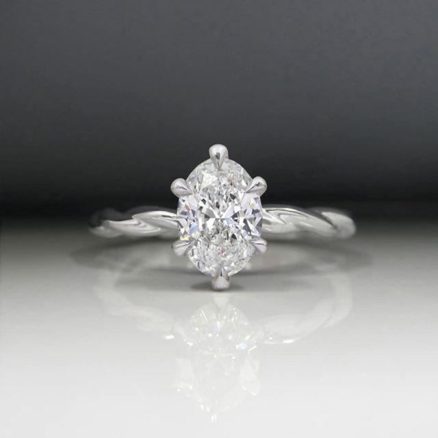 Kimberfire oval solitaire rope band engagement ring