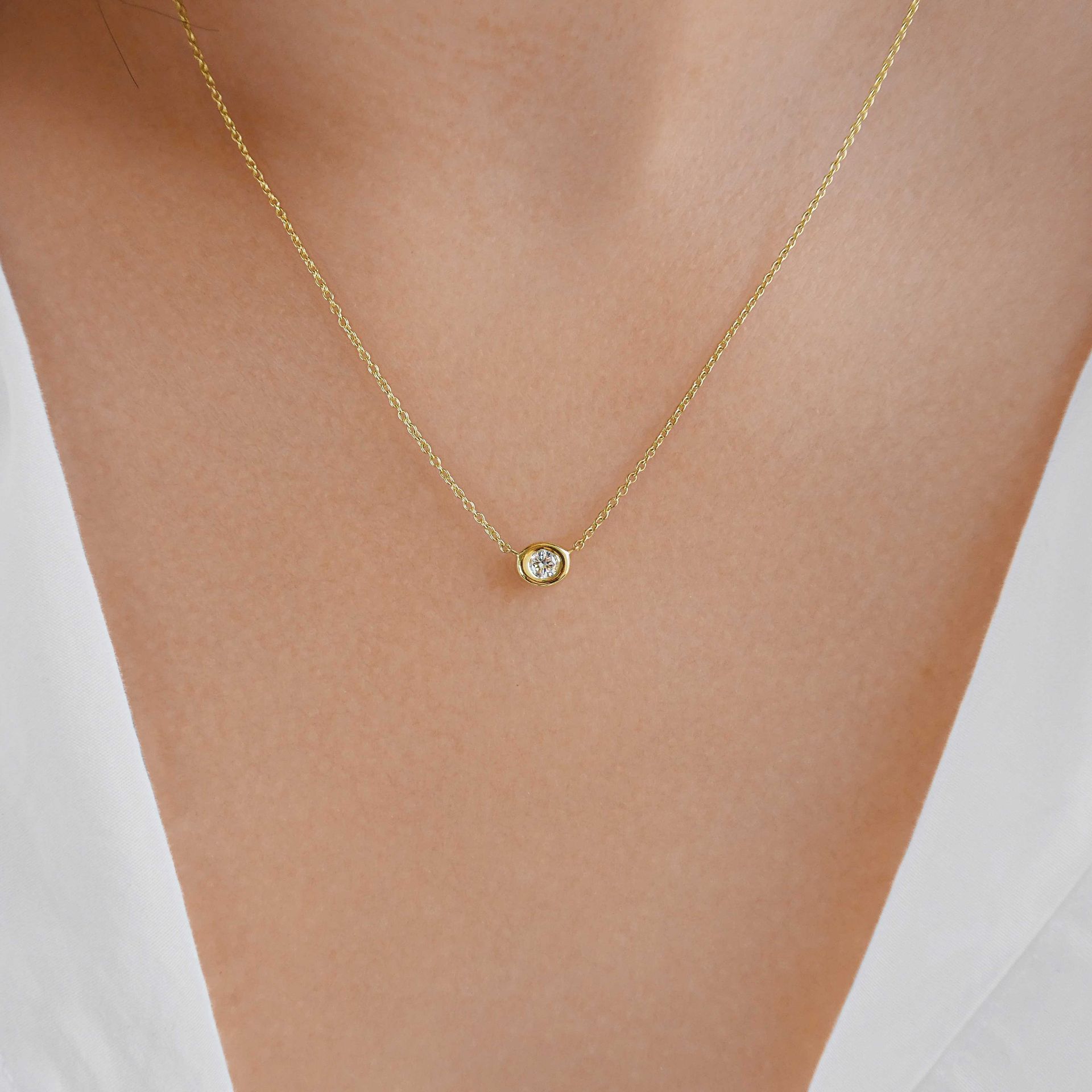Kimberfire Pebble necklace in yellow gold.