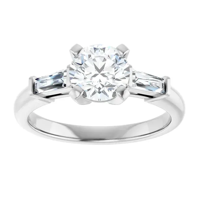 No.9 three stone engagement ring.