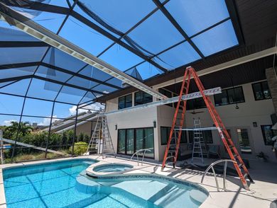 Screened pool cage on sunny day