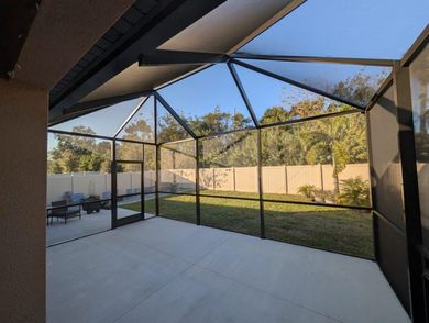 Screen enclosure attached to Florida home