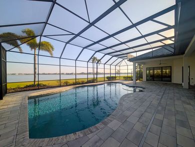 Screened lanai with outdoor seating
