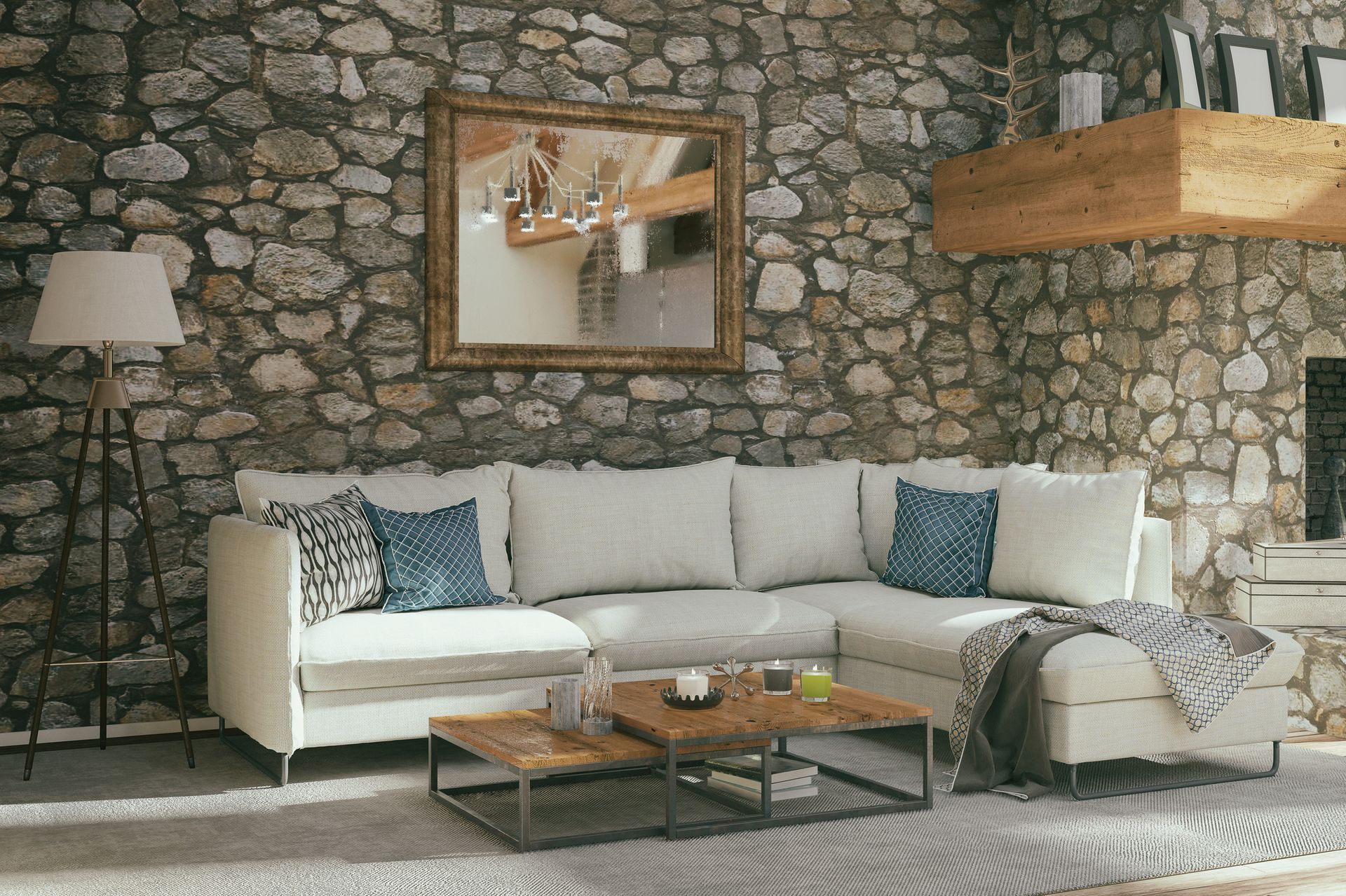 A living room with a white sectional couch and a beautiful stone wall | Louisville, KY | S & S Concrete Inc.