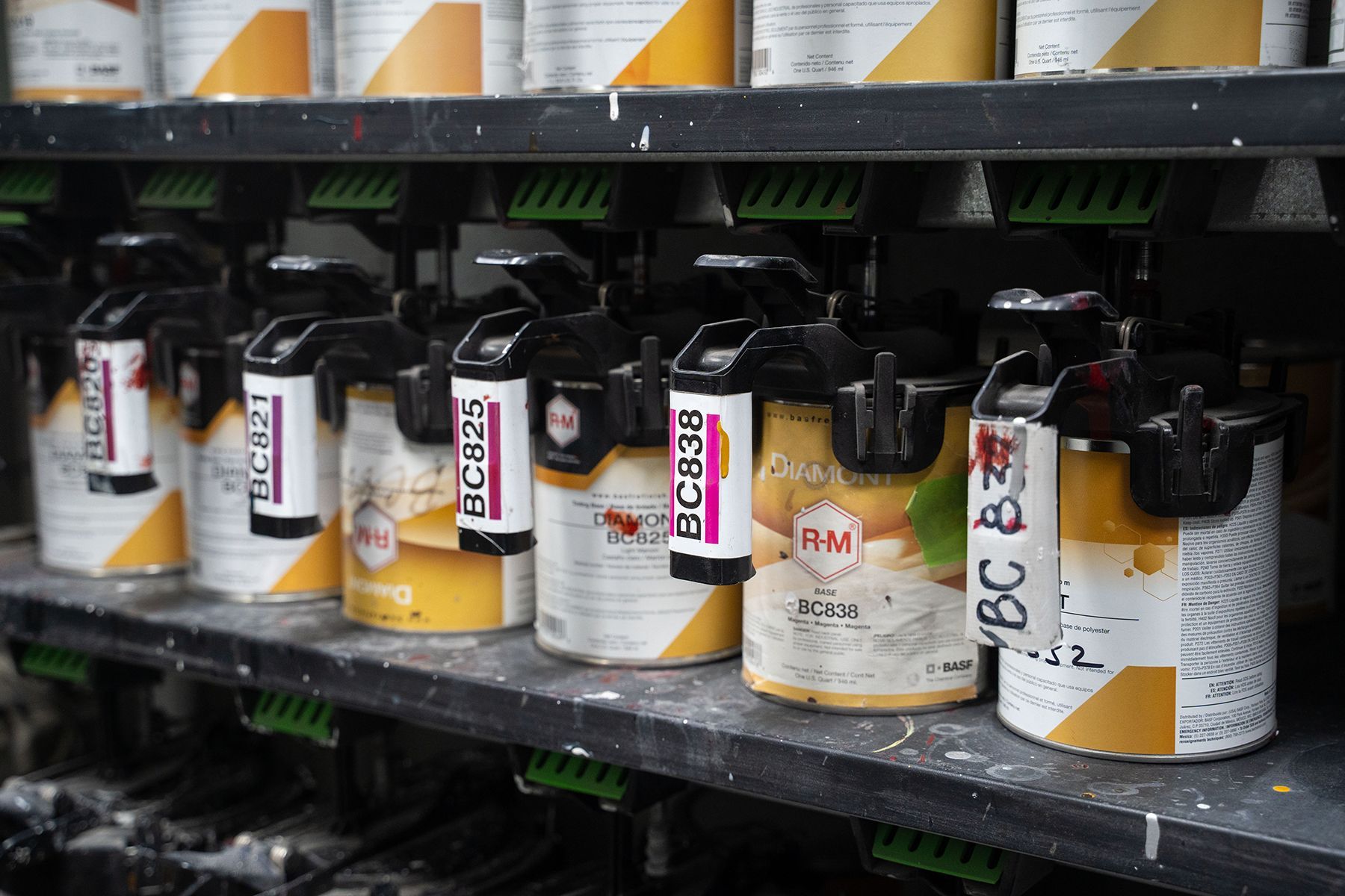 Cans of paint in our garage in Fishkill, NY | Jimmy's Auto Outlet
